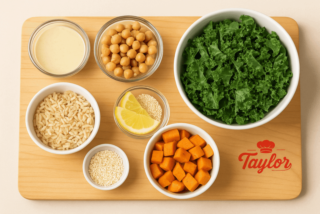 Ingredients for chickpea grain bowl including chickpeas, sweet potatoes, grains, fresh greens, and lemon tahini dressing